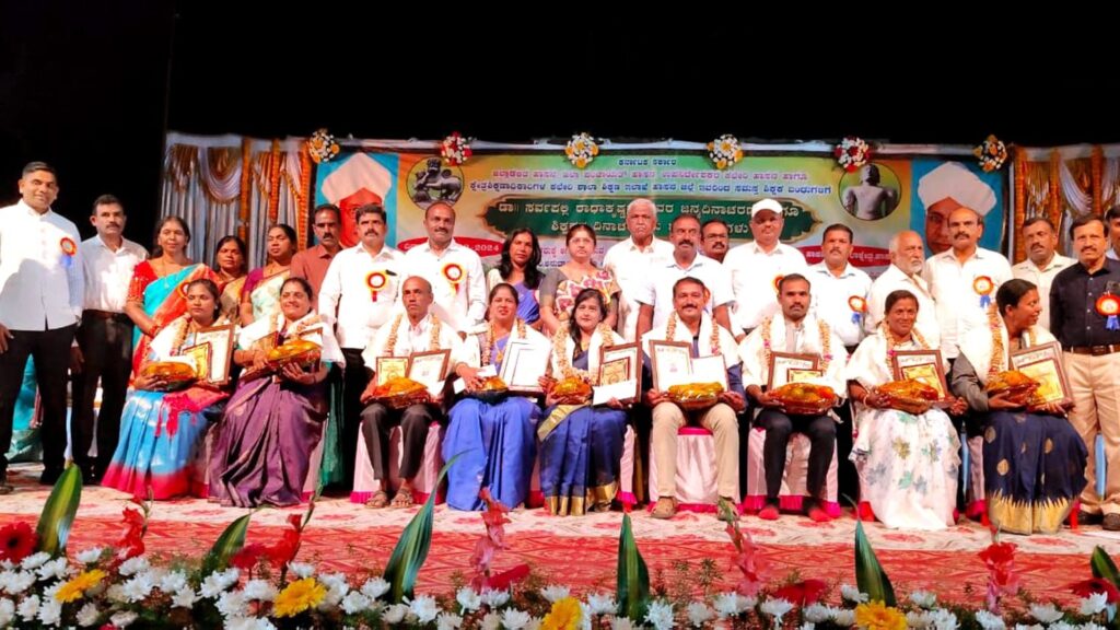 Teachers from district schools being felicitated on Teachers' Day