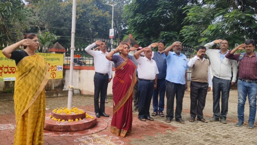 District Collector C. Sathyabama and Hassan district officials at an event to celebrate International Literacy Day on Wednesday.