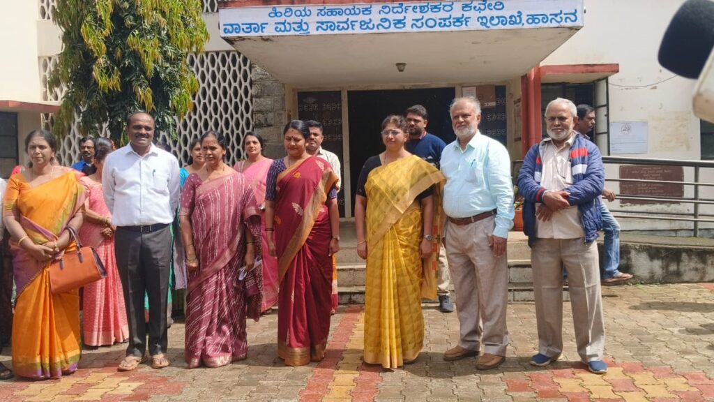 District Collector C. Sathyabama and Hassan district officials at an event to celebrate International Literacy Day on Wednesday.