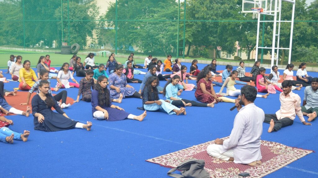 Founder of Swasthya Jeevan Marga Yoga Pratisthan of Nagamangala, Sriyutha Laxman KH Guruji, conducting a yoga programme for students of Navkis Engineering College in Hassan on Tuesday.
