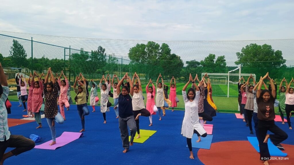 Founder of Swasthya Jeevan Marga Yoga Pratisthan of Nagamangala, Sriyutha Laxman KH Guruji, conducting a yoga programme for students of Navkis Engineering College in Hassan on Tuesday.