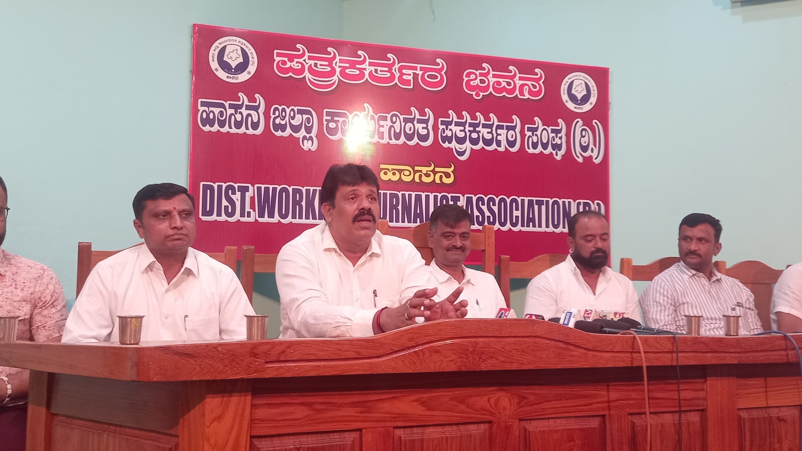 Shivaswamy faction addressing the media in Hassan on Tuesday.