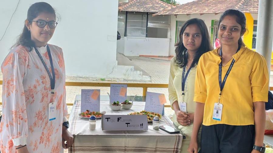 Students of Navkis Engineering College presenting foods unique to Karnataka at a food fair on the occasion.