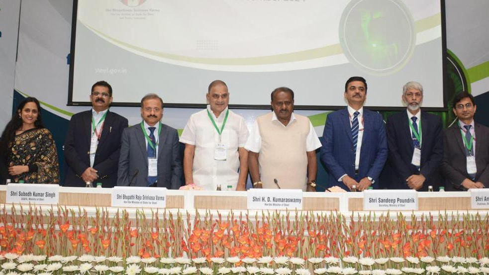 Union Steel Minister H D Kumaraswamy and officials during the report release programme in New Delhi.
