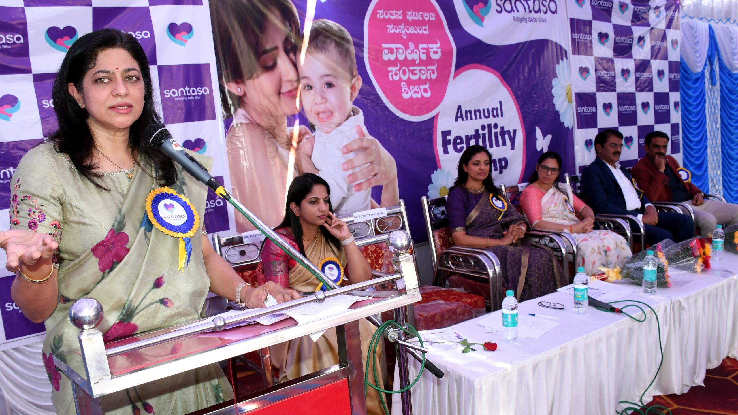 Visuals from a programme held by the IVF centre to announce its free screening camp.
