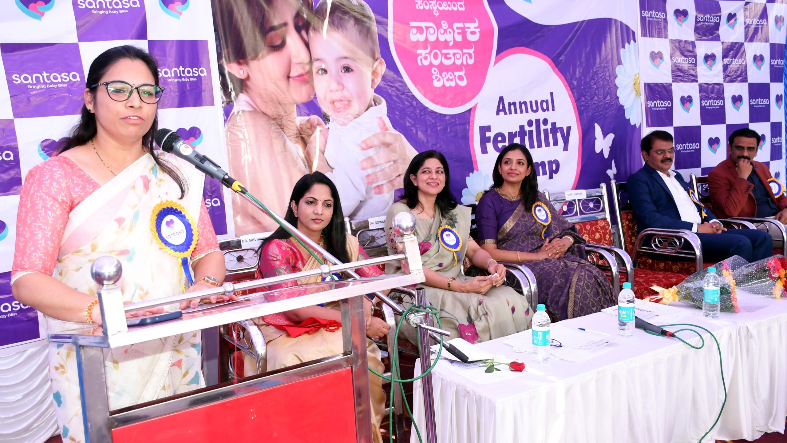 Visuals from a programme held by the IVF centre to announce its free screening camp.