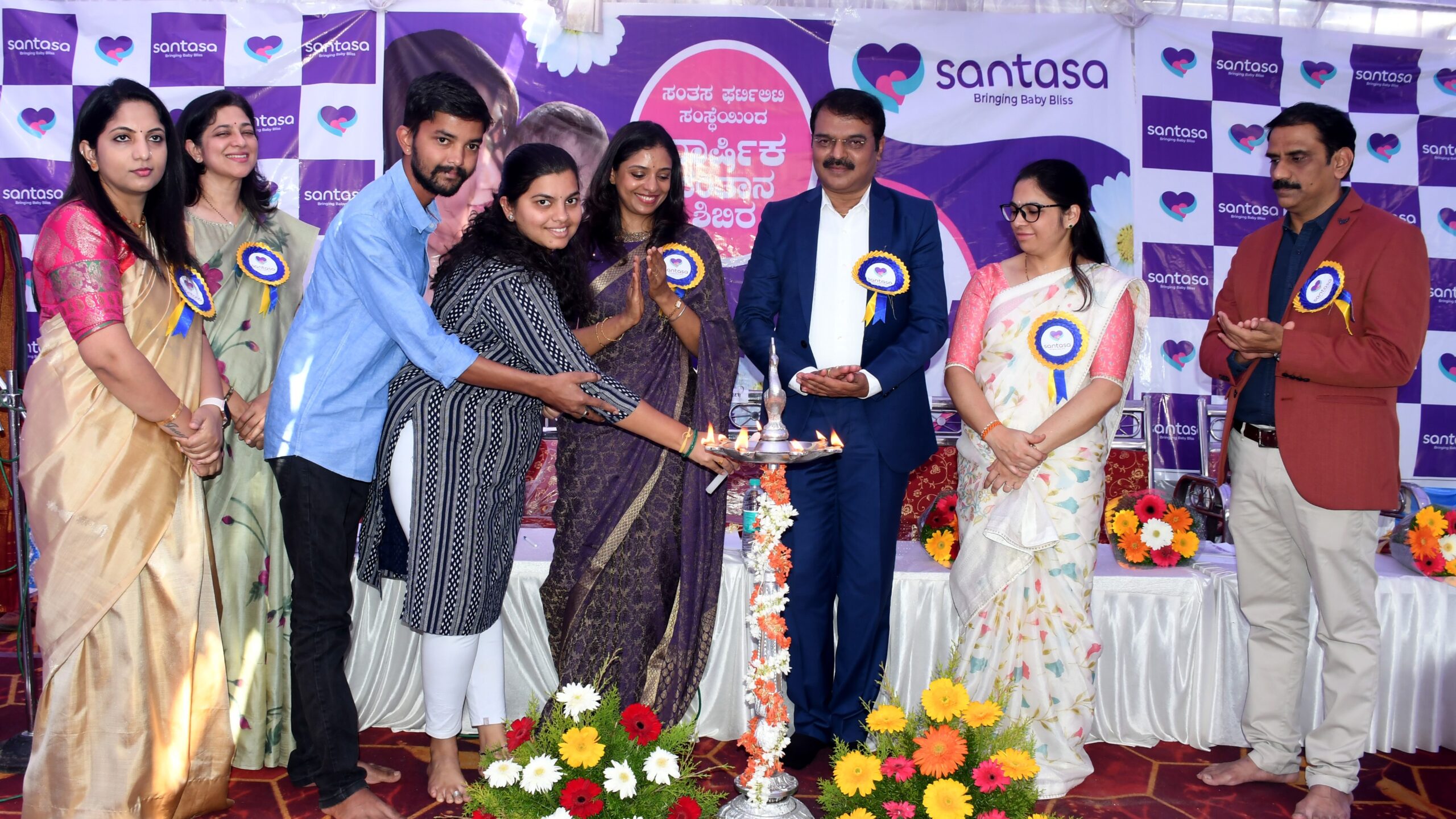 Visuals from a programme held by the IVF centre to announce its free screening camp.