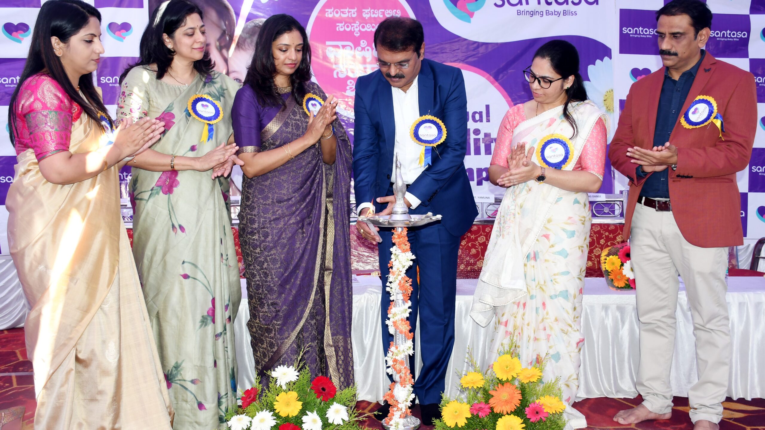 Visuals from a programme held by the IVF centre to announce its free screening camp.