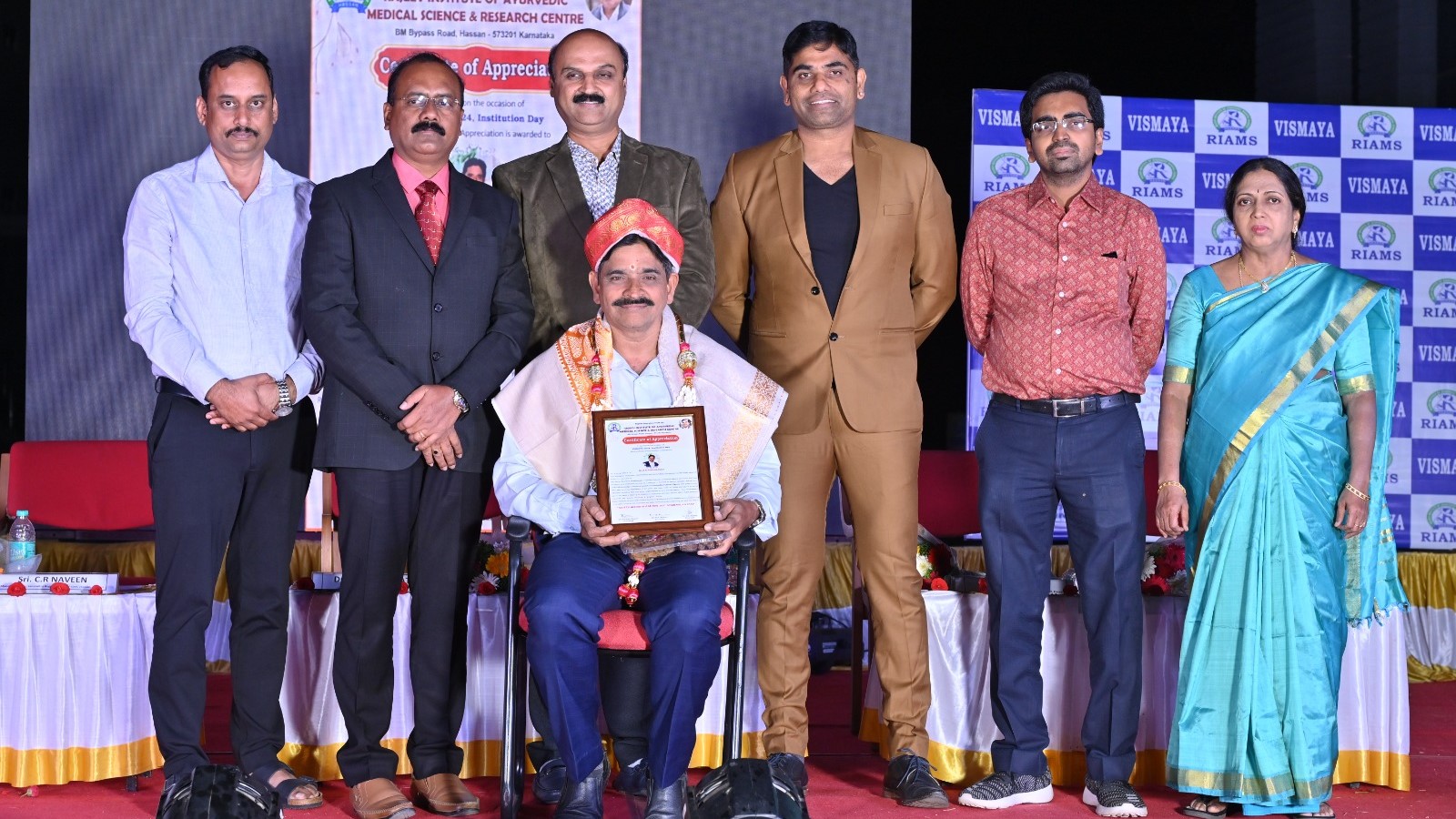 Top contributors of Rajiv Ayurveda College being honoured by the institution on Wednesday.