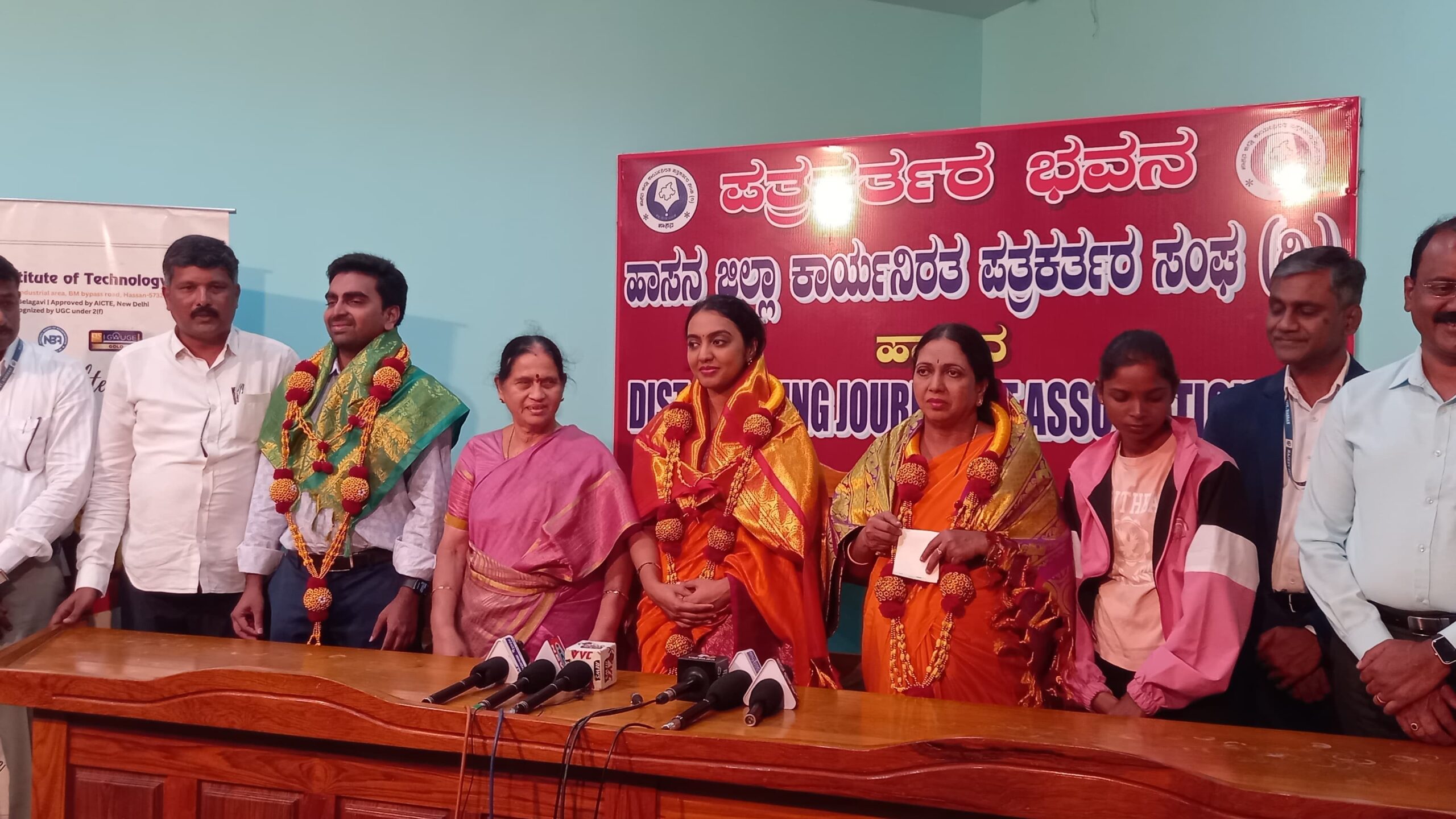 Rajiv Institute of Technology managing committee members speak to the media on Tuesday.