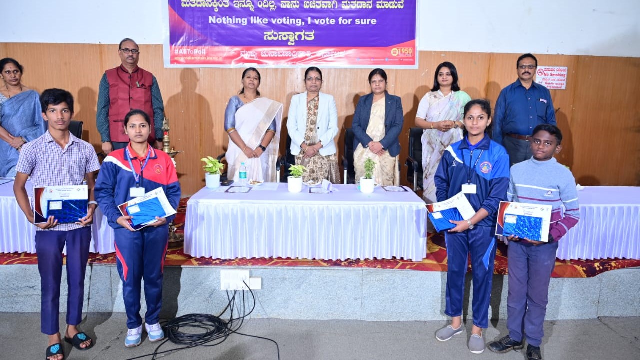 Participants during a National Voters Day programme in Hassan
