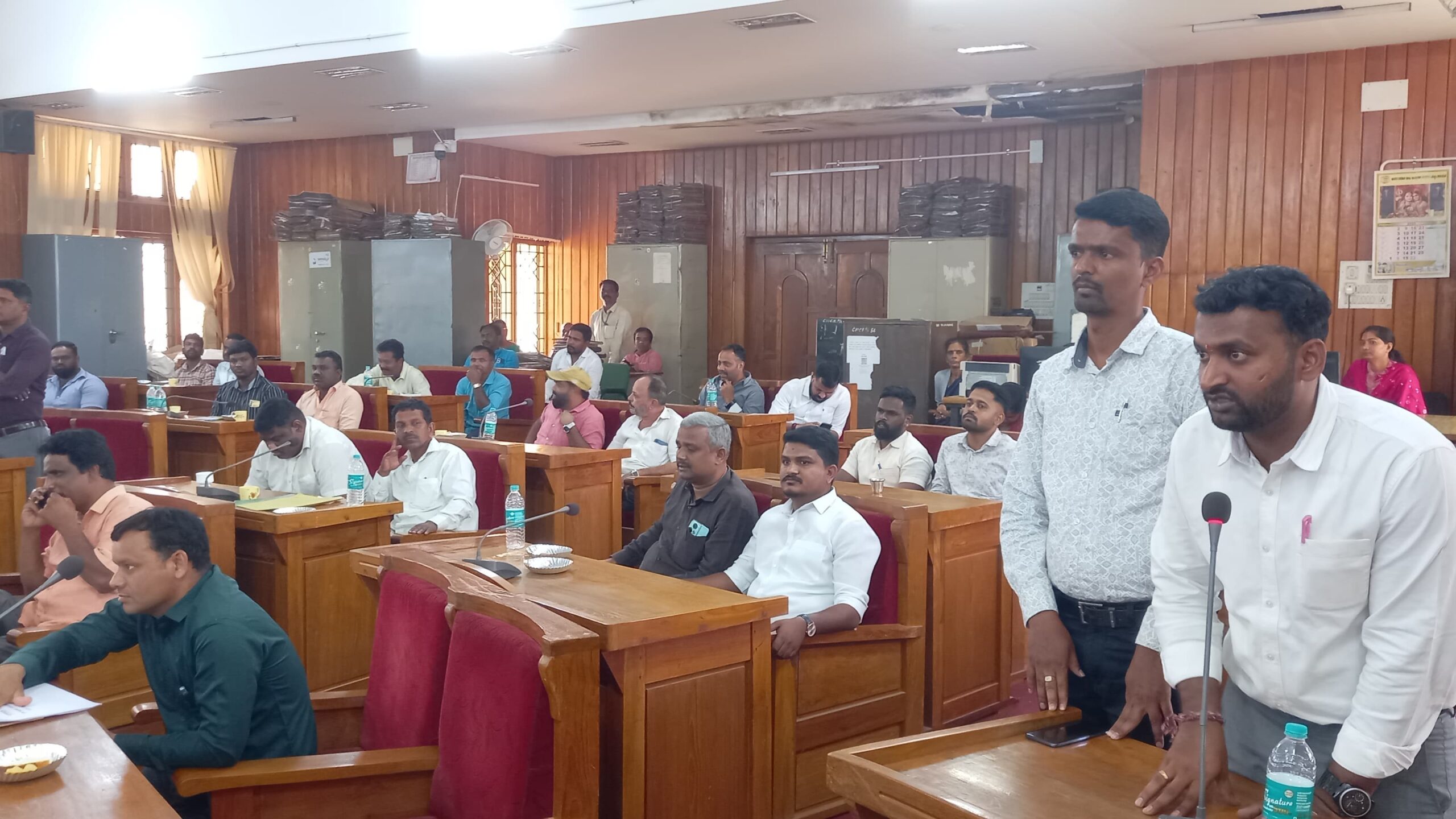 Hassan MP Shreyas Patel chairing a meeting at the Hassan municipality.