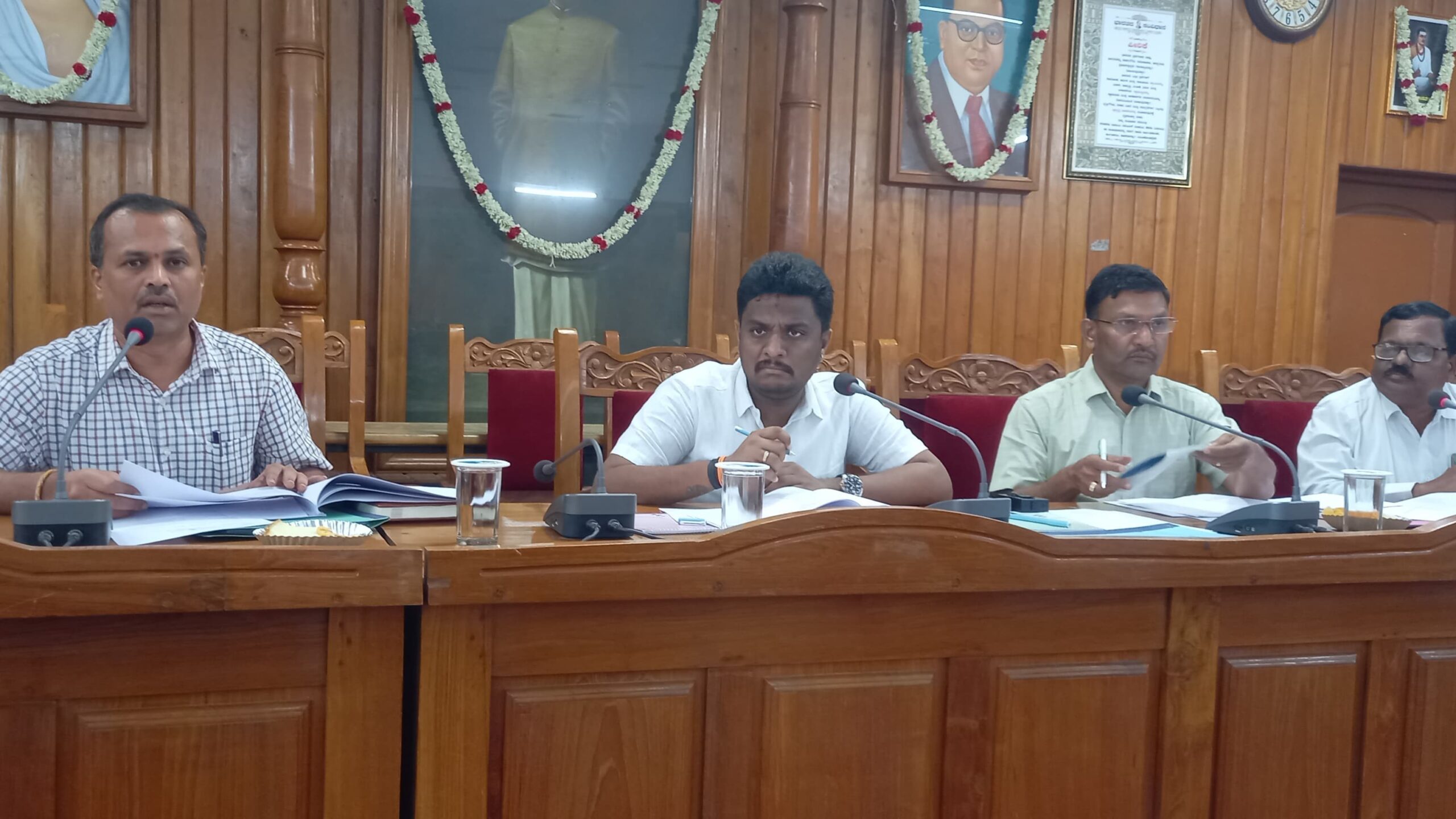 Hassan MP Shreyas Patel chairing a meeting at the Hassan municipality.