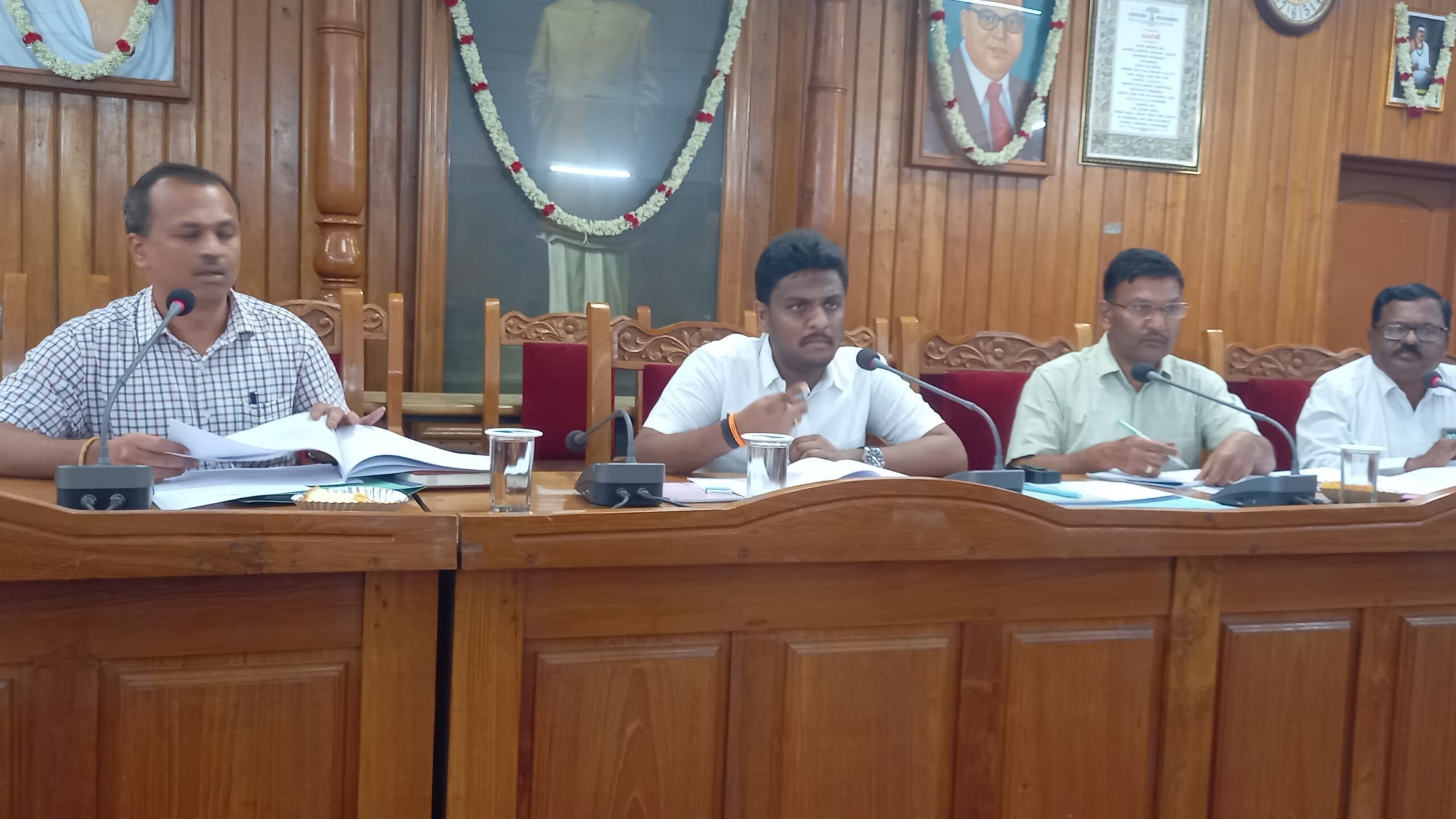 Hassan MP Shreyas Patel chairing a meeting at the Hassan municipality.
