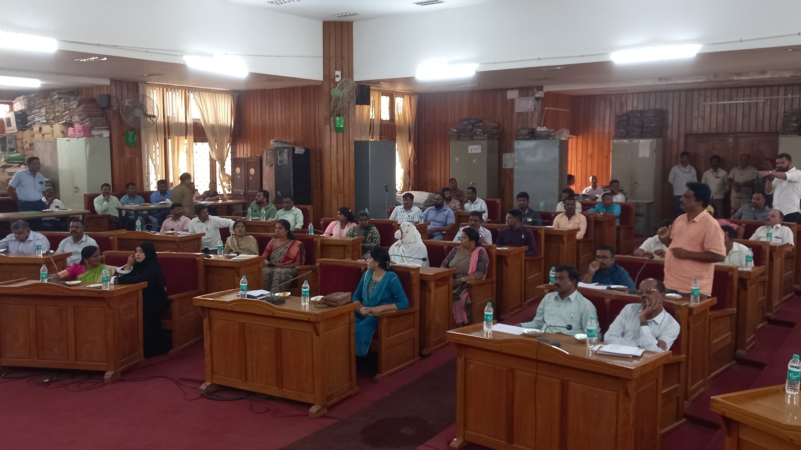 Hassan MP Shreyas Patel chairing a meeting at the Hassan municipality.