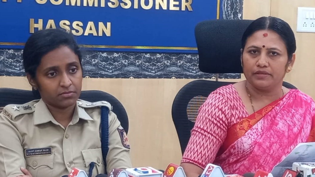 Hassan DC and SP addressing the media on new law governing the microfinance industry.