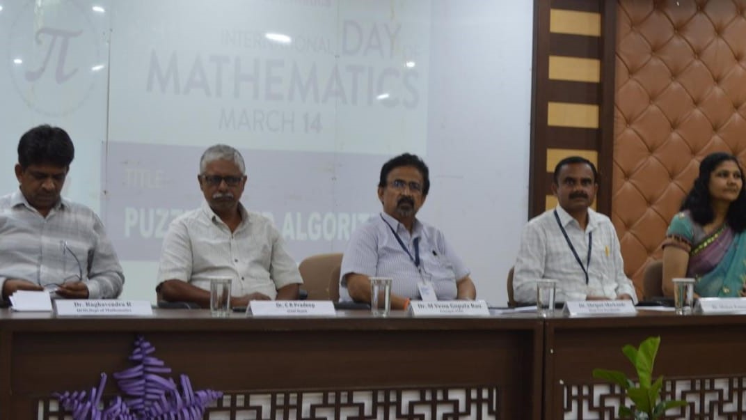 Visuals from the International Mathematics Day event held at Navkis College of Engineering in Hassan.