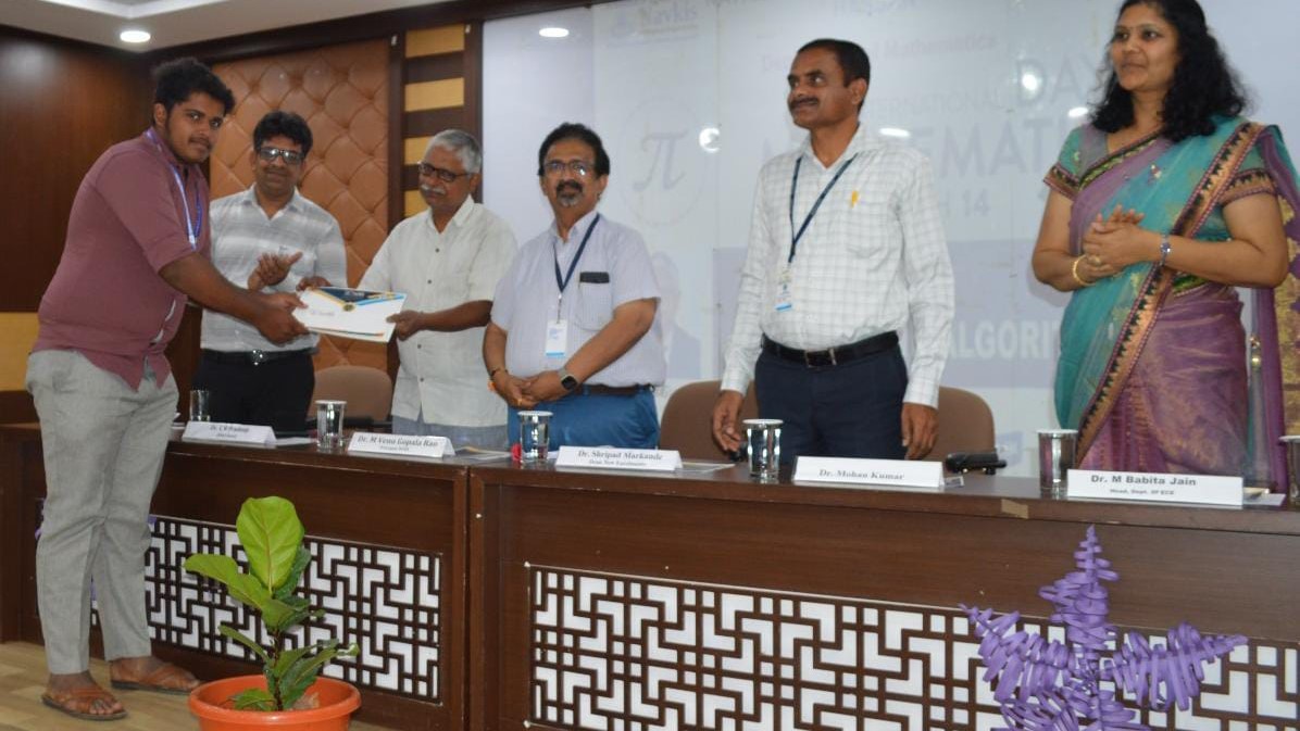 Visuals from the International Mathematics Day event held at Navkis College of Engineering in Hassan.