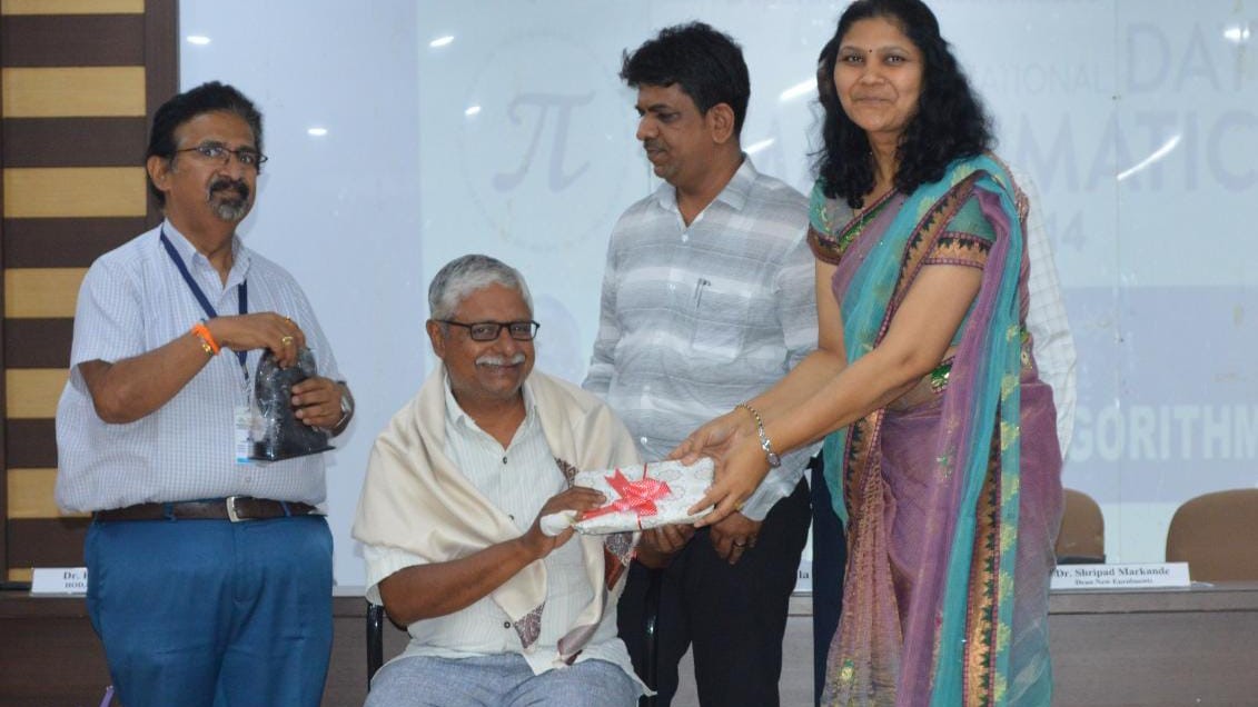 Visuals from the International Mathematics Day event held at Navkis College of Engineering in Hassan.